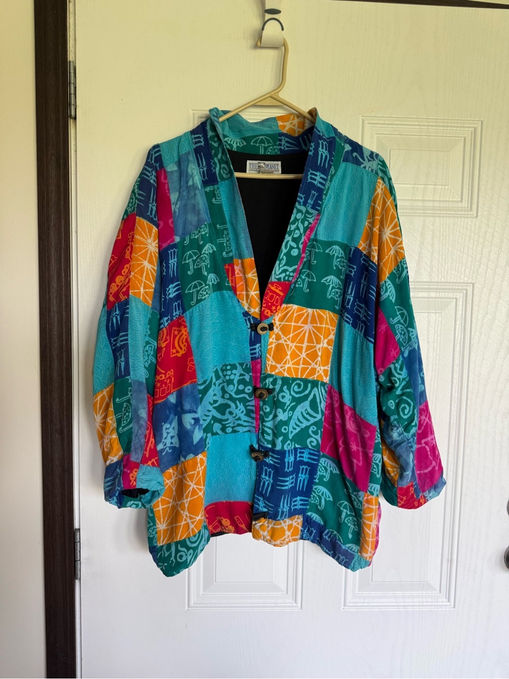 Vintage The planet patchwork jacket with batik prints , coconut shell buttons
